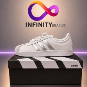 حذاء Adidas حريمي أبيض بخطوط فضي مقاس 38