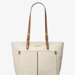 شنطة Michael Kors حريمي توت كريمي بمونوجرام MK ويد جلد عسلي